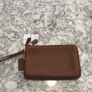Brown leather wristlet